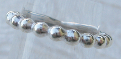 Anello fascia in Argento lavorato