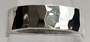 Anello fascia in Argento battuto