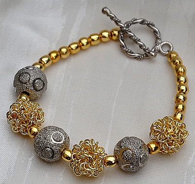 Bracciale in Argento smerigliato e Argento placcato Oro