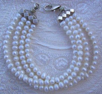 Bracciale in Argento e fili di Perle 